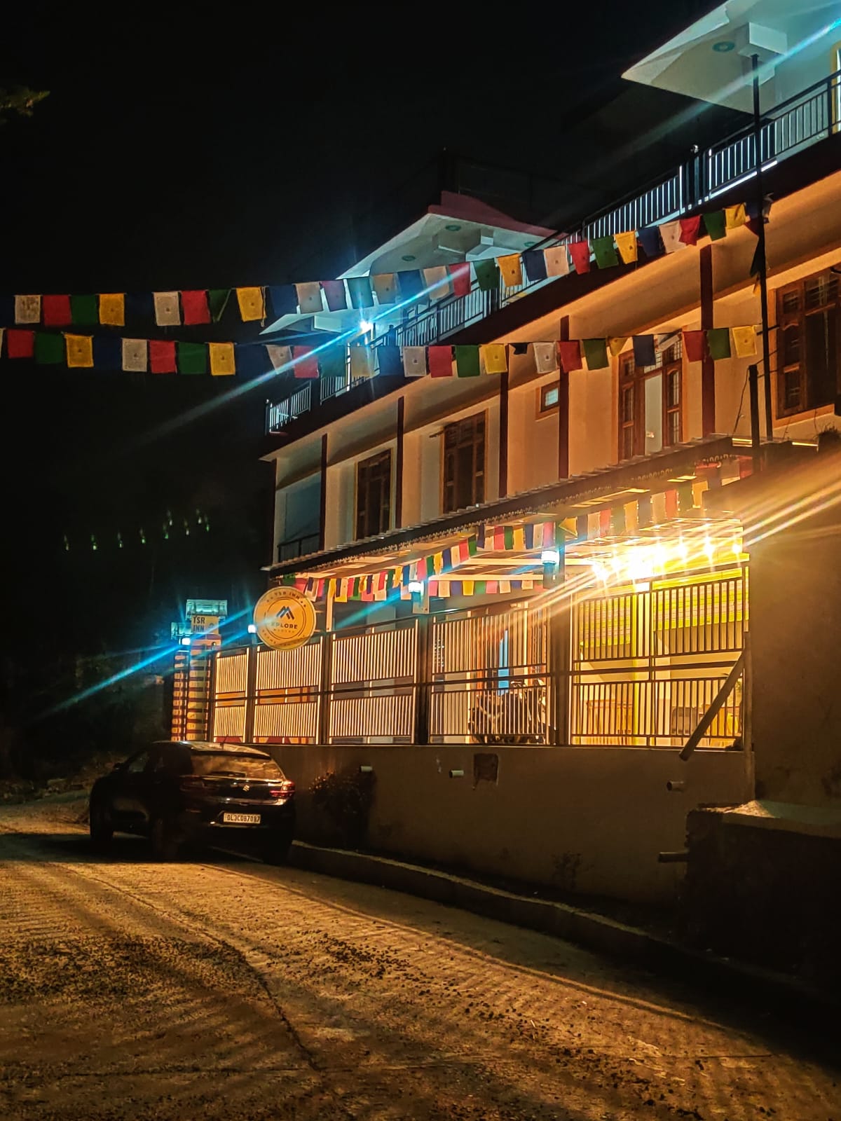 a homestay lit by night light — that’s such a cozy, cinematic image